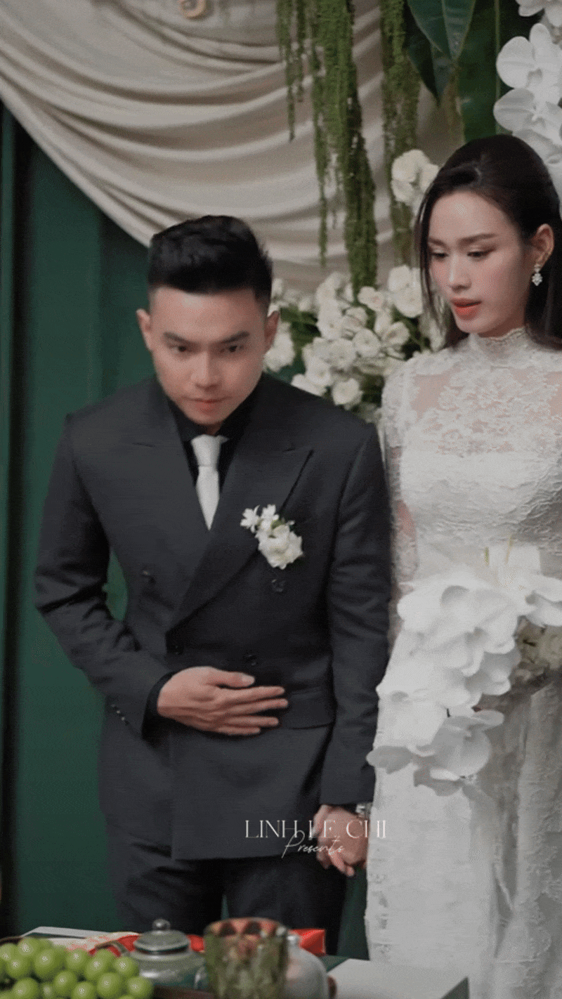 Người đẹp sinh năm 2001 có hành động chớp nhoáng ôm và xoa bụng khi đứng cạnh ông xã